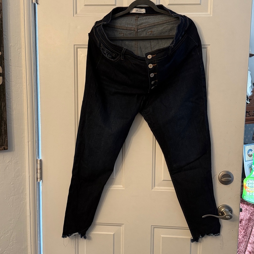KanCan Button Fly Jeans Slightly distressed on pockets and raw edge of legs